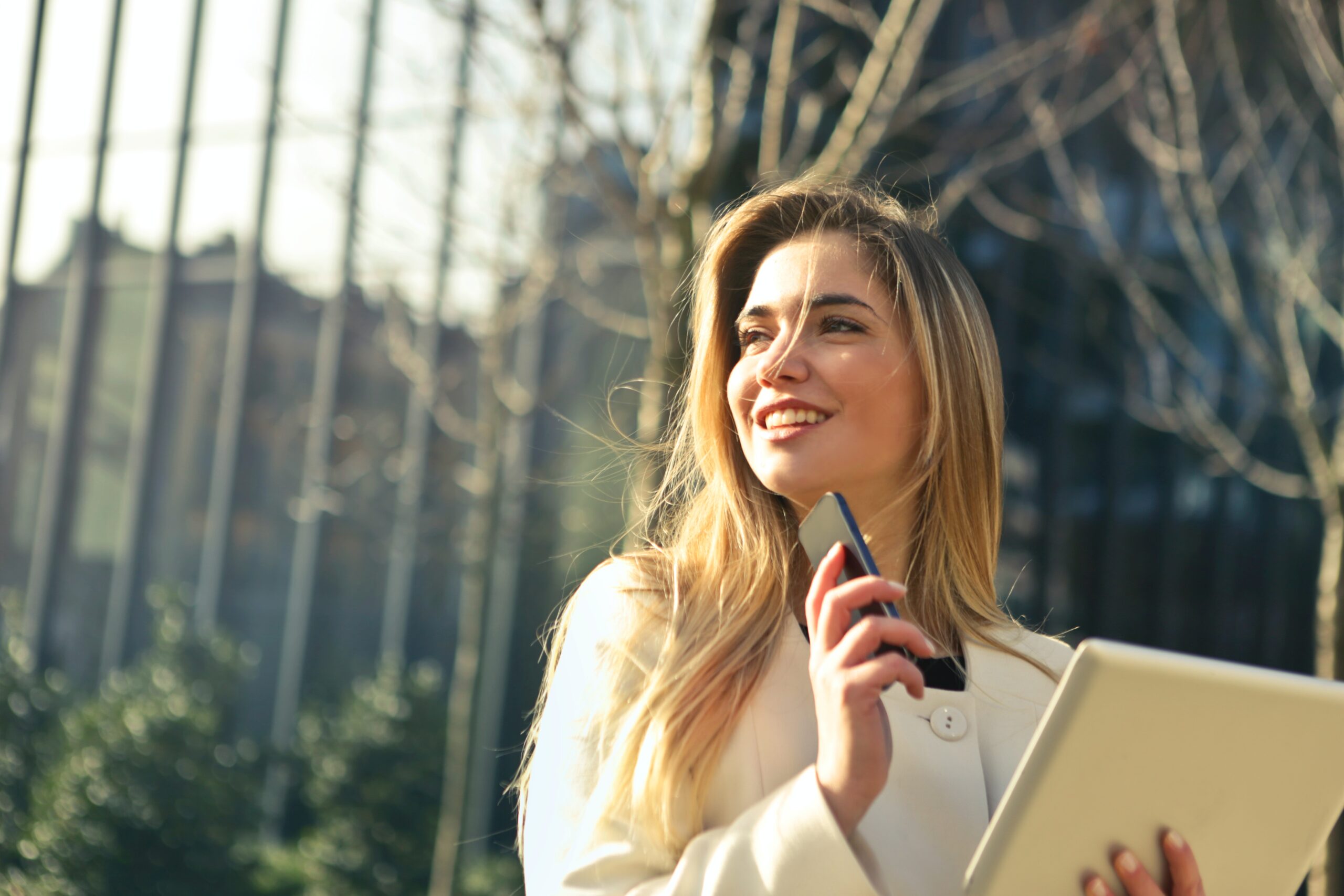 blond woman walking in the sun