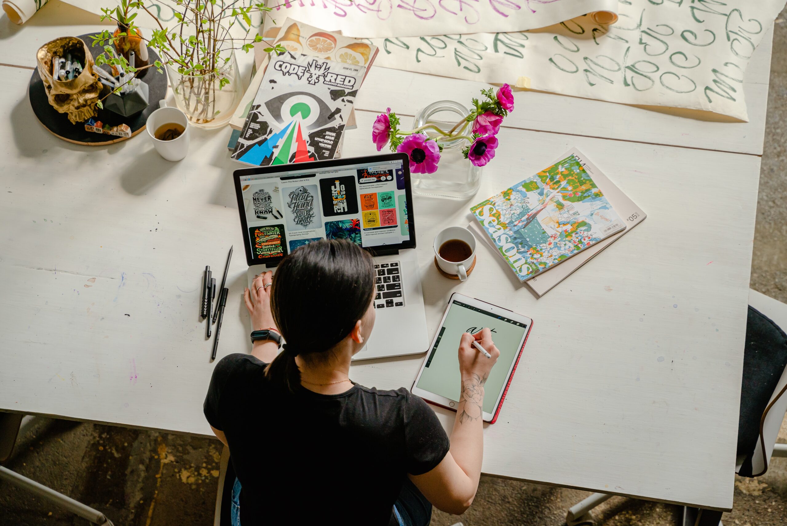 woman doing art on her computer