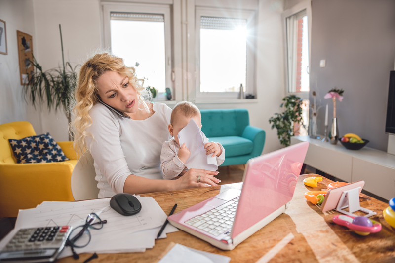 Picture of mother running a business