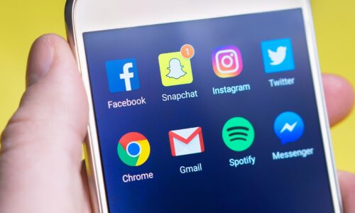 iPhone displaying different social media app icons