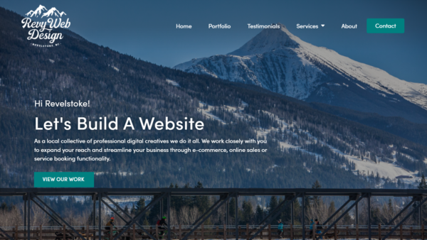 screenshot of revywebdesign.com landing page. Mountain view with words over the top. 