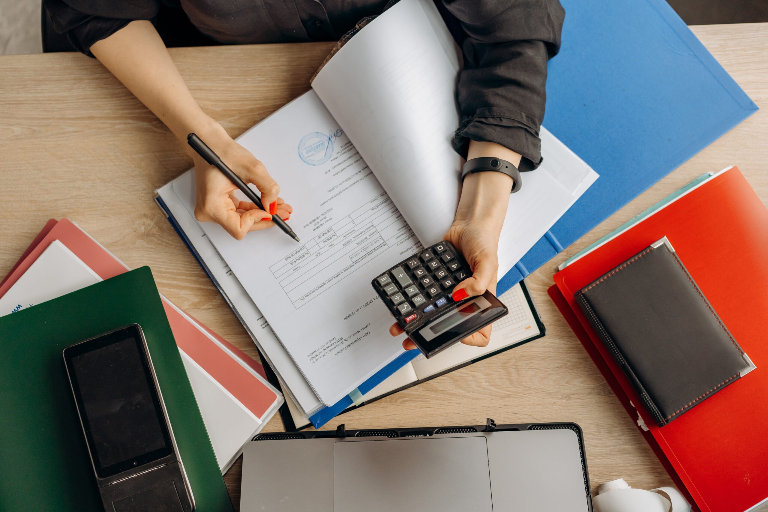 person examining financial documents